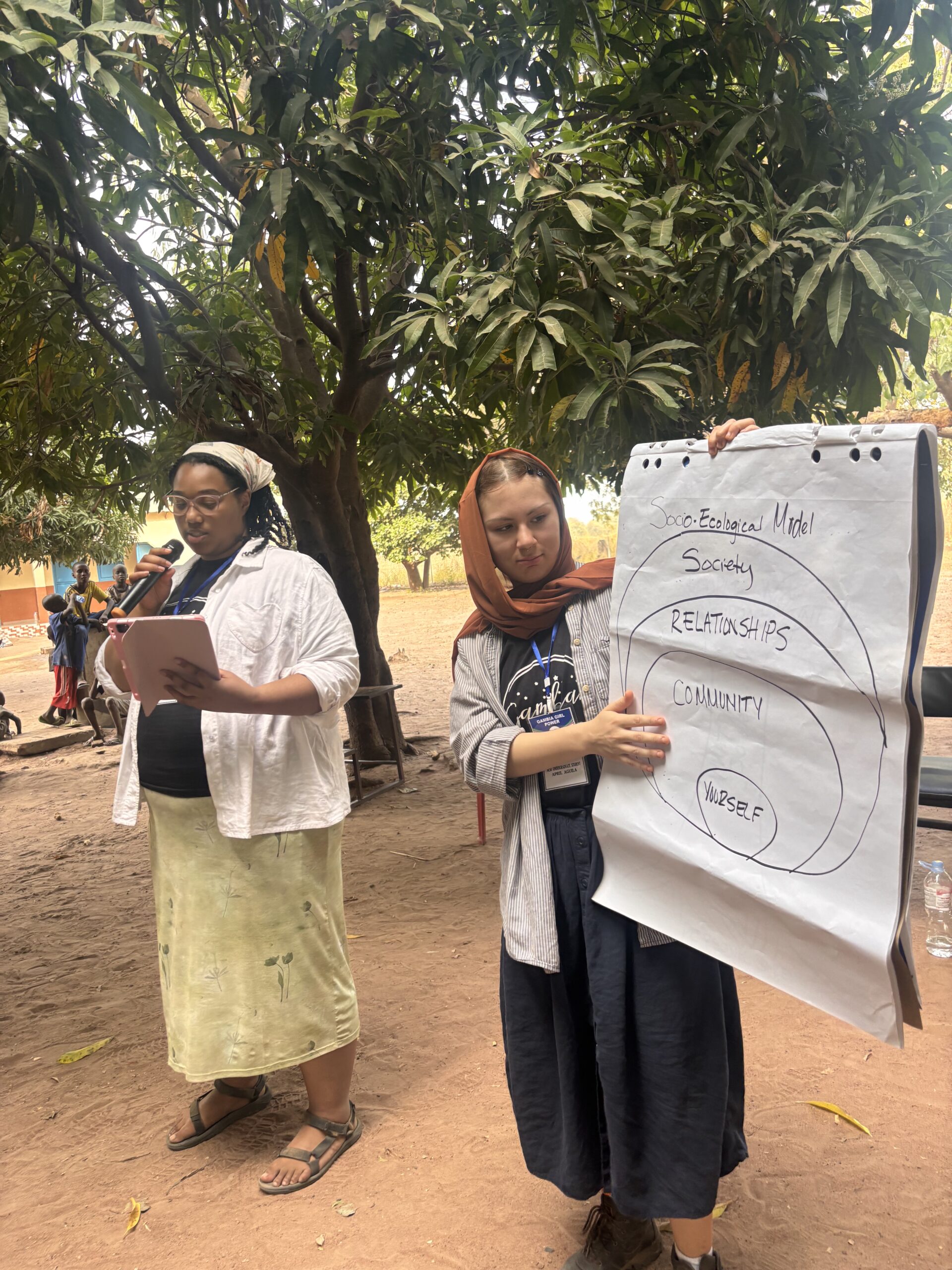 students teaching during a study abroad experience in Gambia