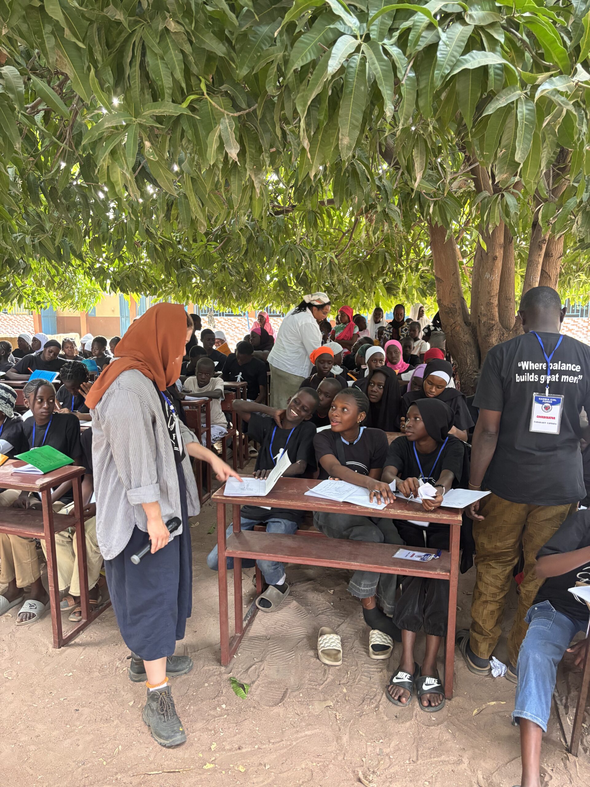 students teaching during a study abroad experience in Gambia